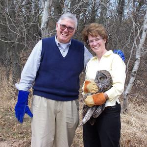 Paul Verret with Dr. Julia Ponder with great gray owl